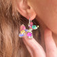 Balloon Dog bloom hoop earrings.