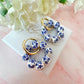 Gold Blue White floral bead ring hoop earrings.