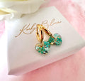 Gold Tiny Turquoise bloom heart Huggies earrings.