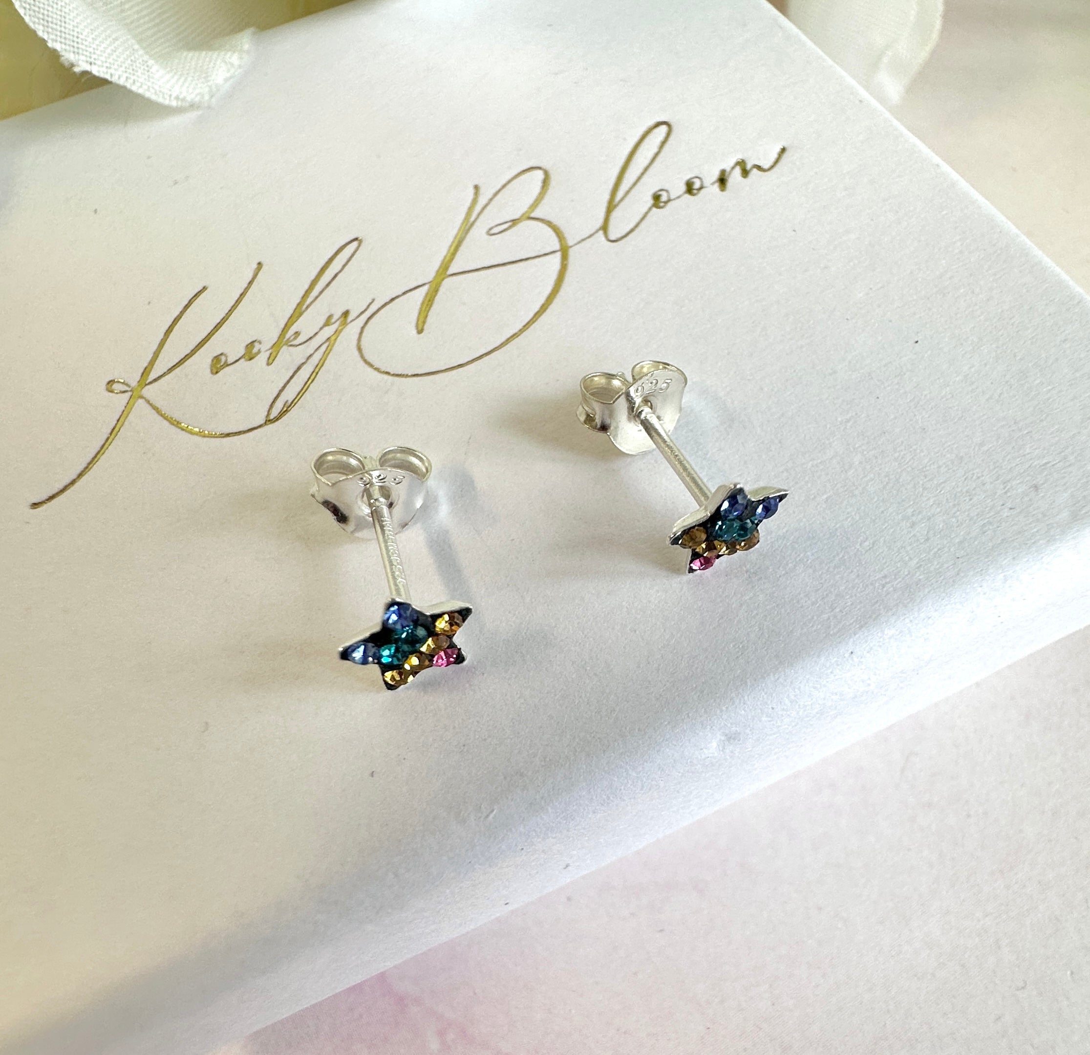 925 sterling silver Tiny black rainbow diamanté Star studs.