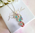 Silver real flower & seashell Seahorse necklace.