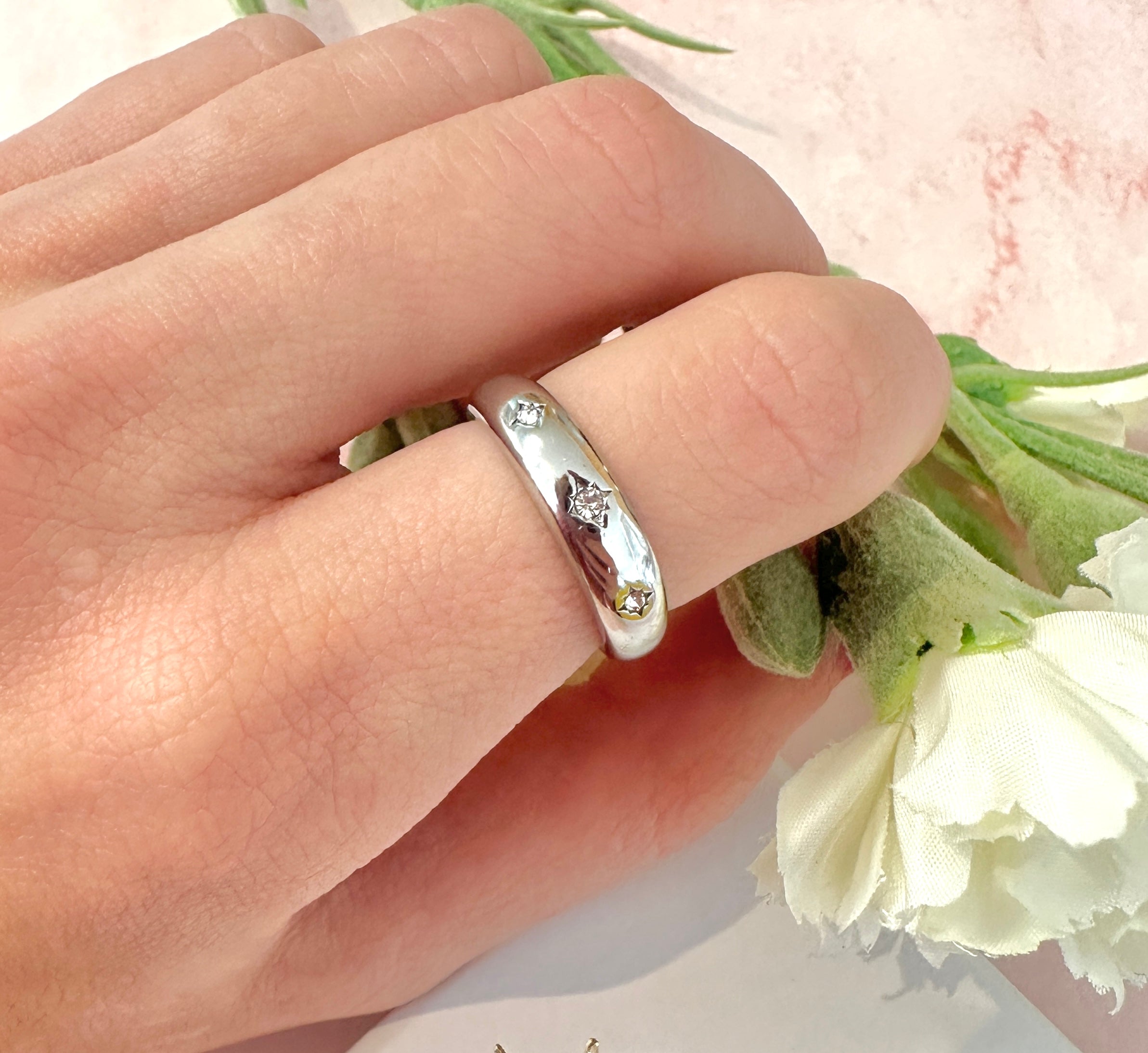 Silver Triple CZ domed band ring.