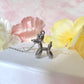 Silver Balloon dog necklace.