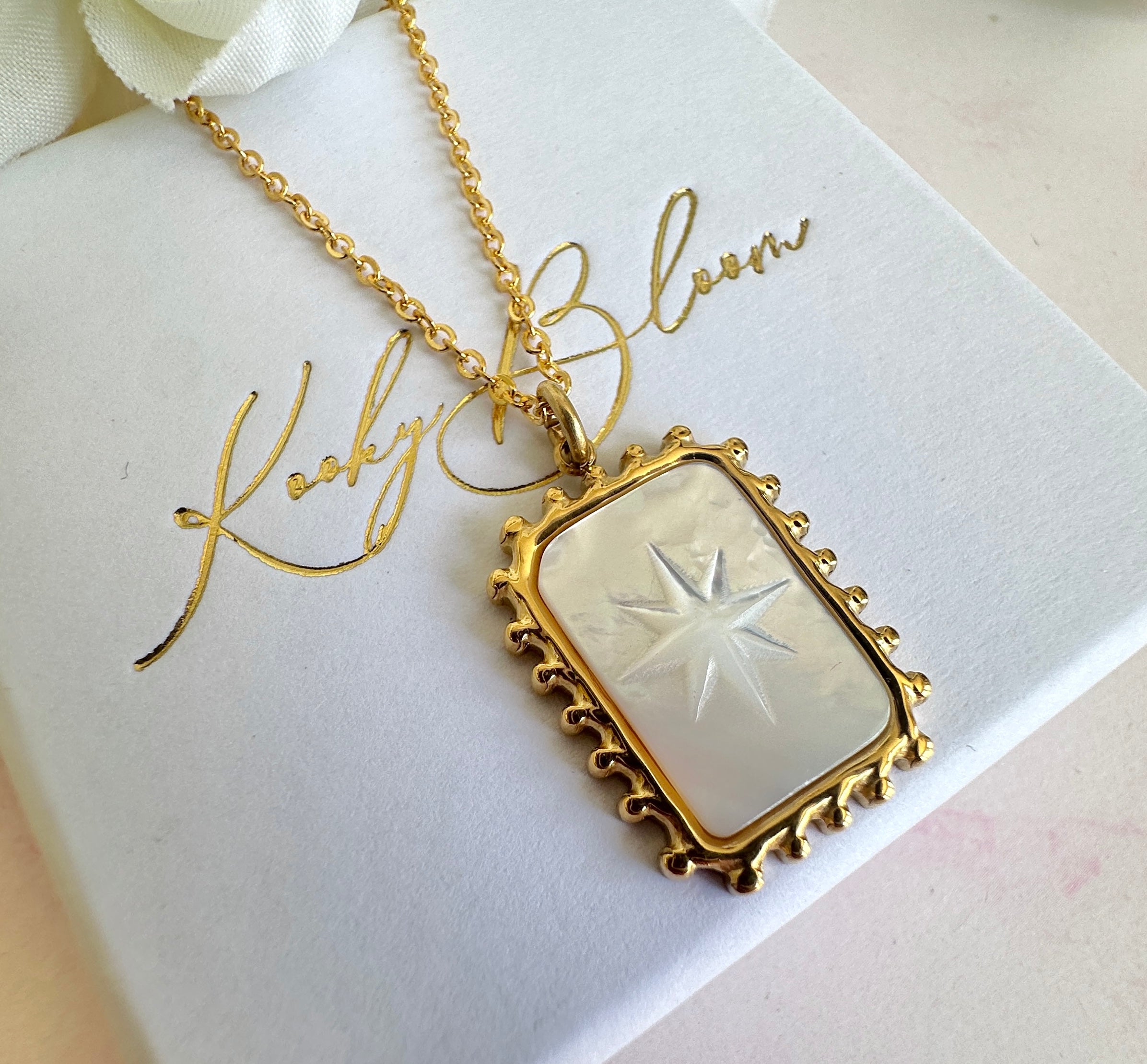 Gold engraved Star shell rectangle necklace.