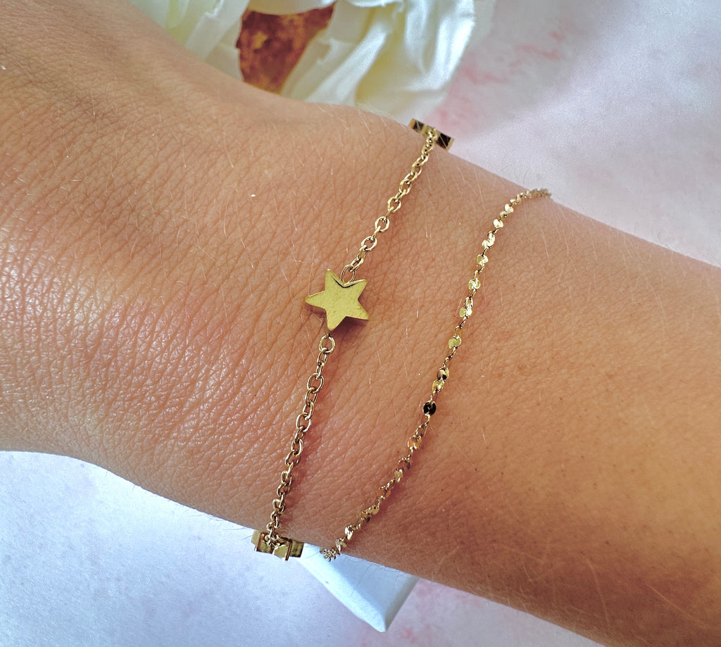 Gold Star layered bracelet.