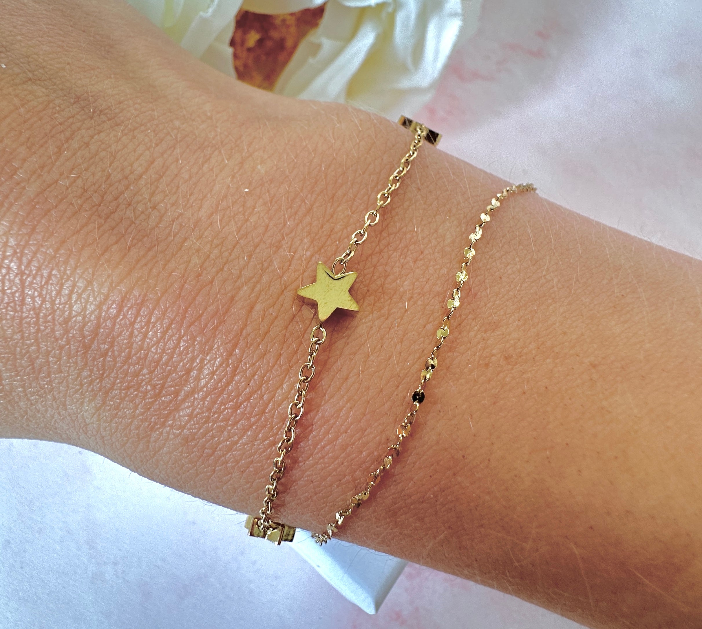 Gold Star layered bracelet.