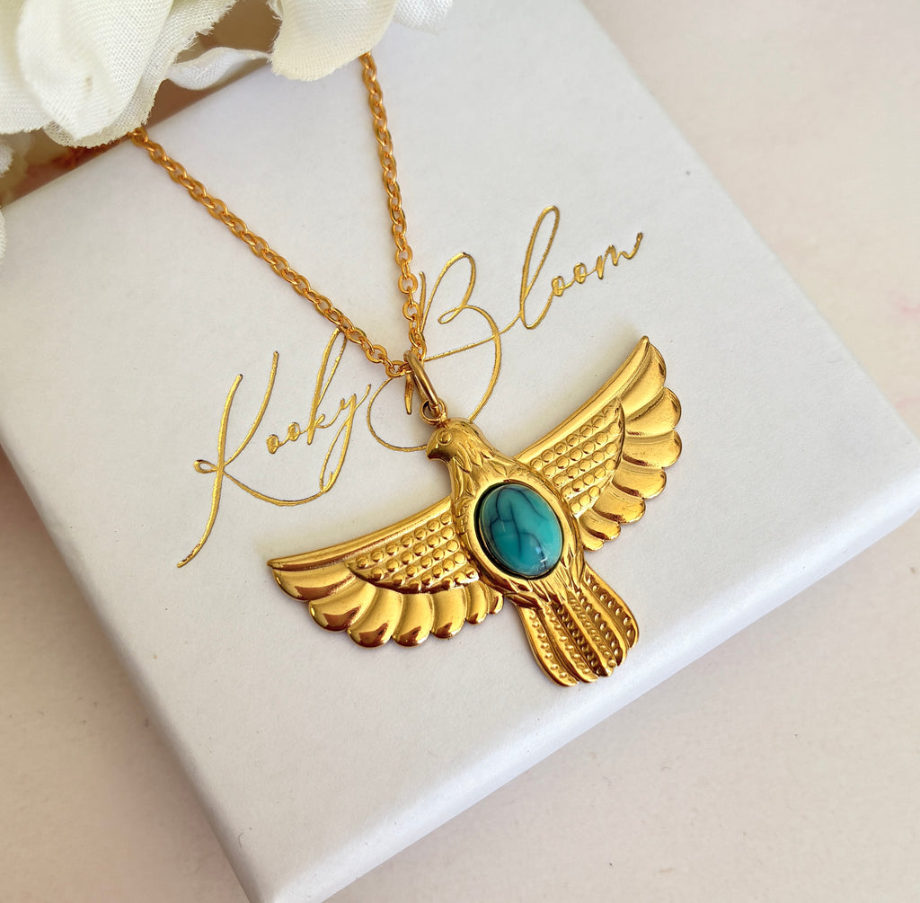Gold Turquoise Eagle necklace.