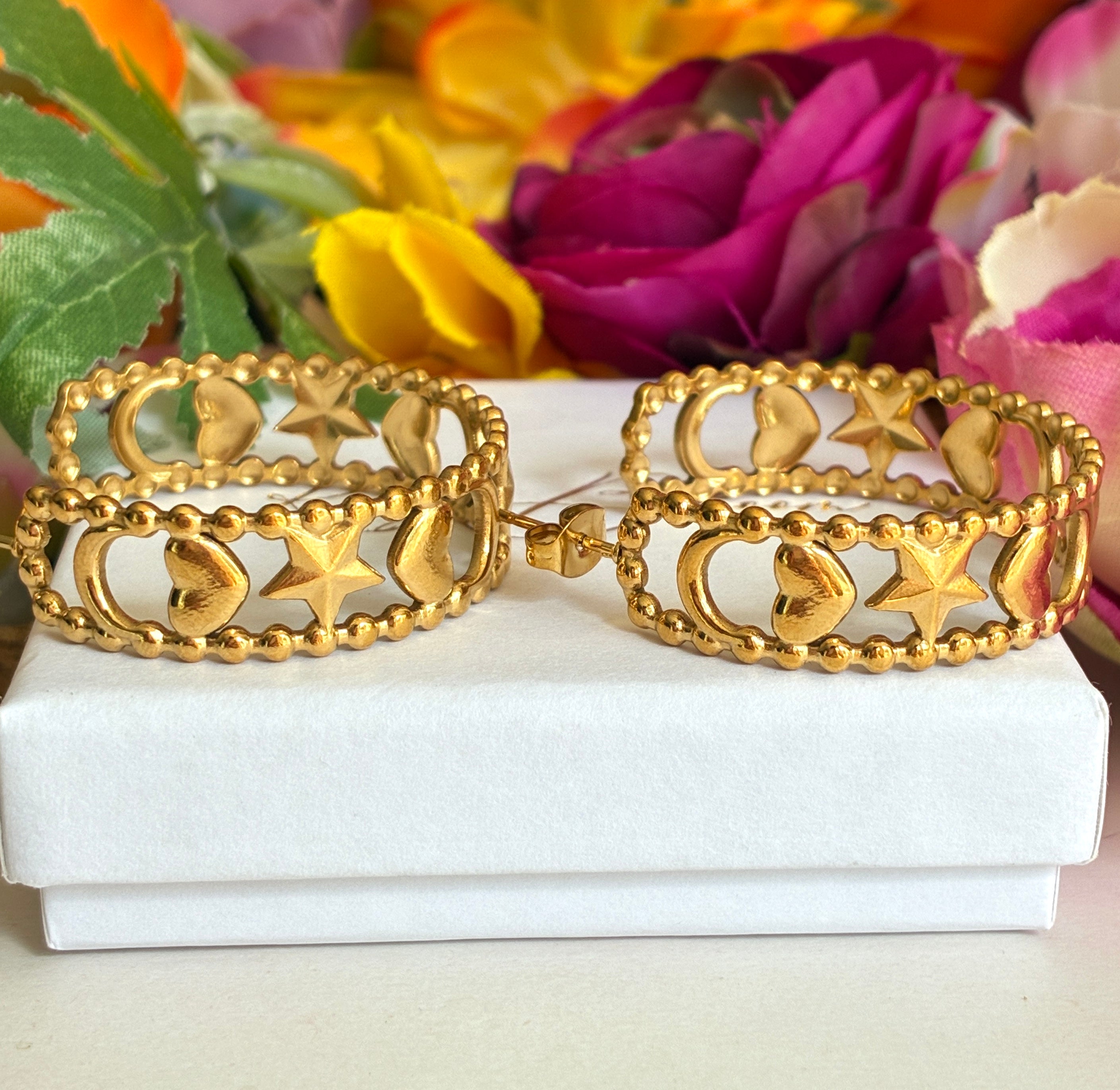 Gold star moon heart hoop earrings.