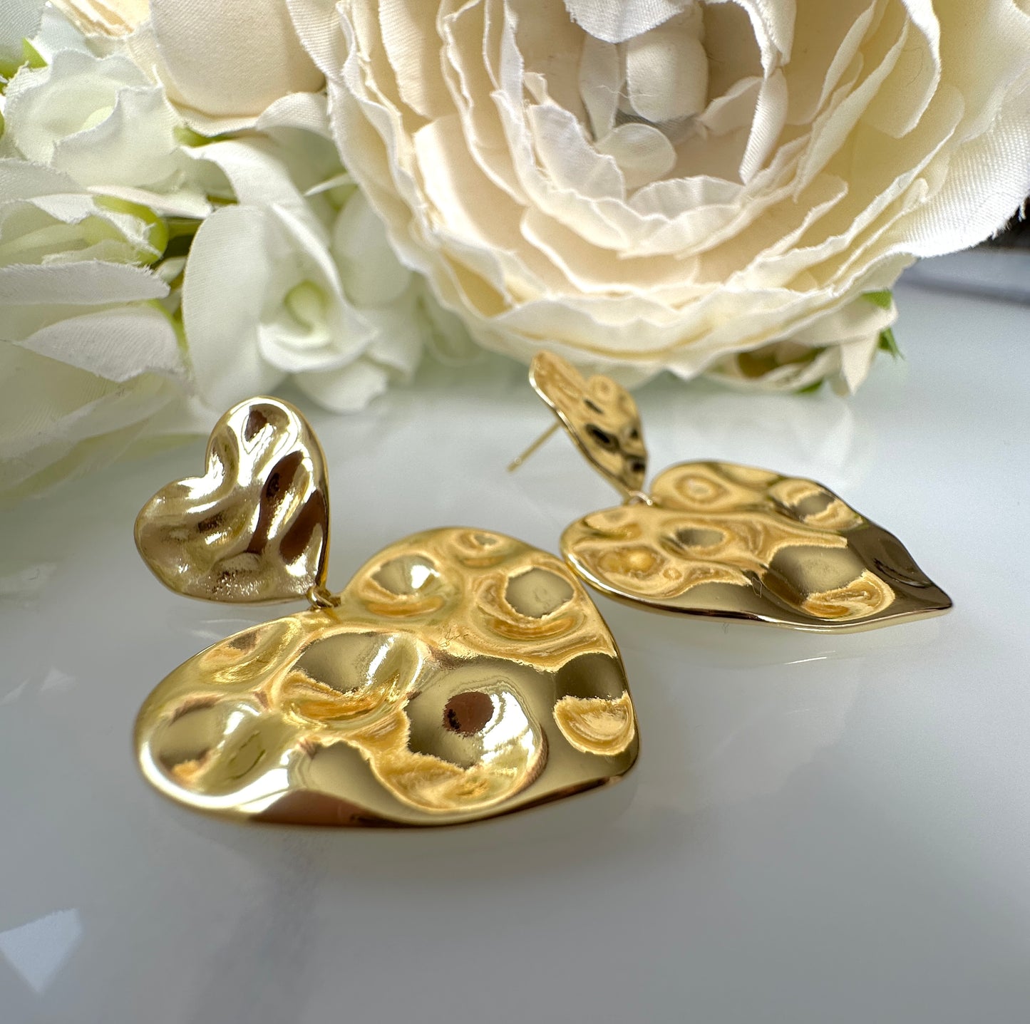 Gold hammered Heart Drop earrings.