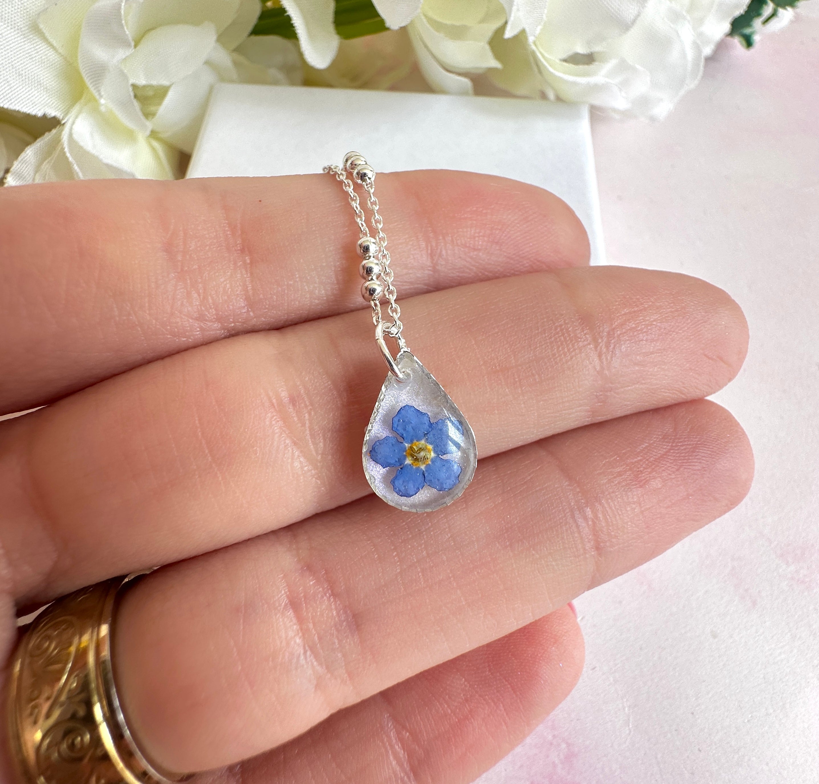 925 sterling silver Forget me not flower Teardrop bracelet.