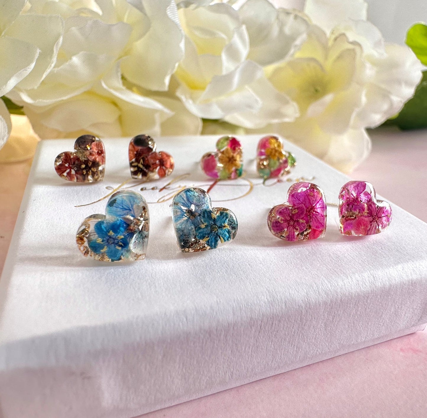 Teeny Bloom heart 925 sterling silver stud earrings.