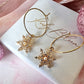 Gold Pearl Cz Snowflake hoop earrings.