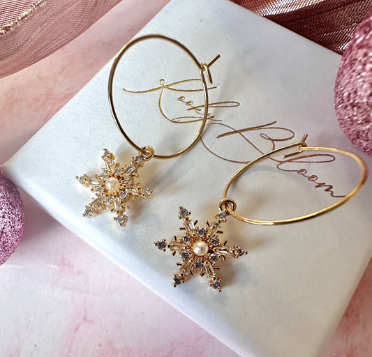 Gold Pearl Cz Snowflake hoop earrings.