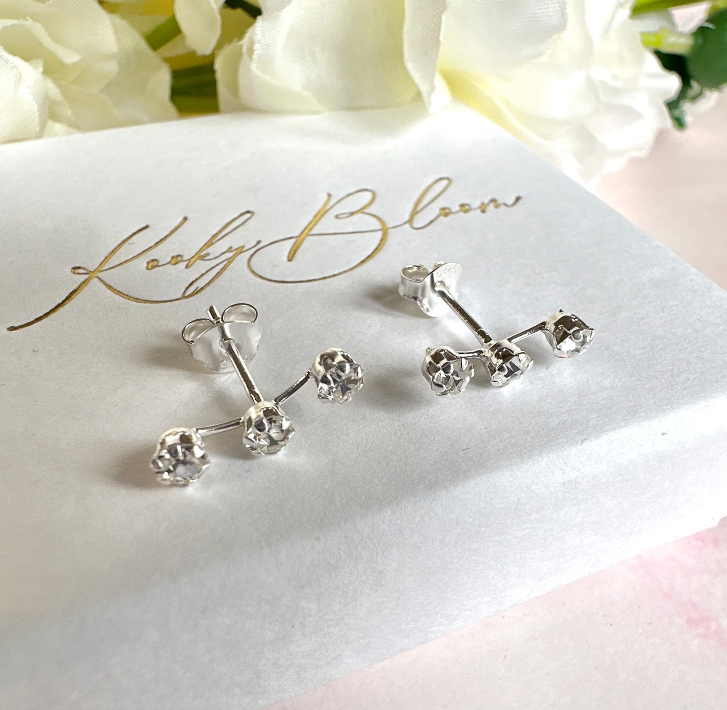 925 sterling silver Triple CZ climber stud earrings.
