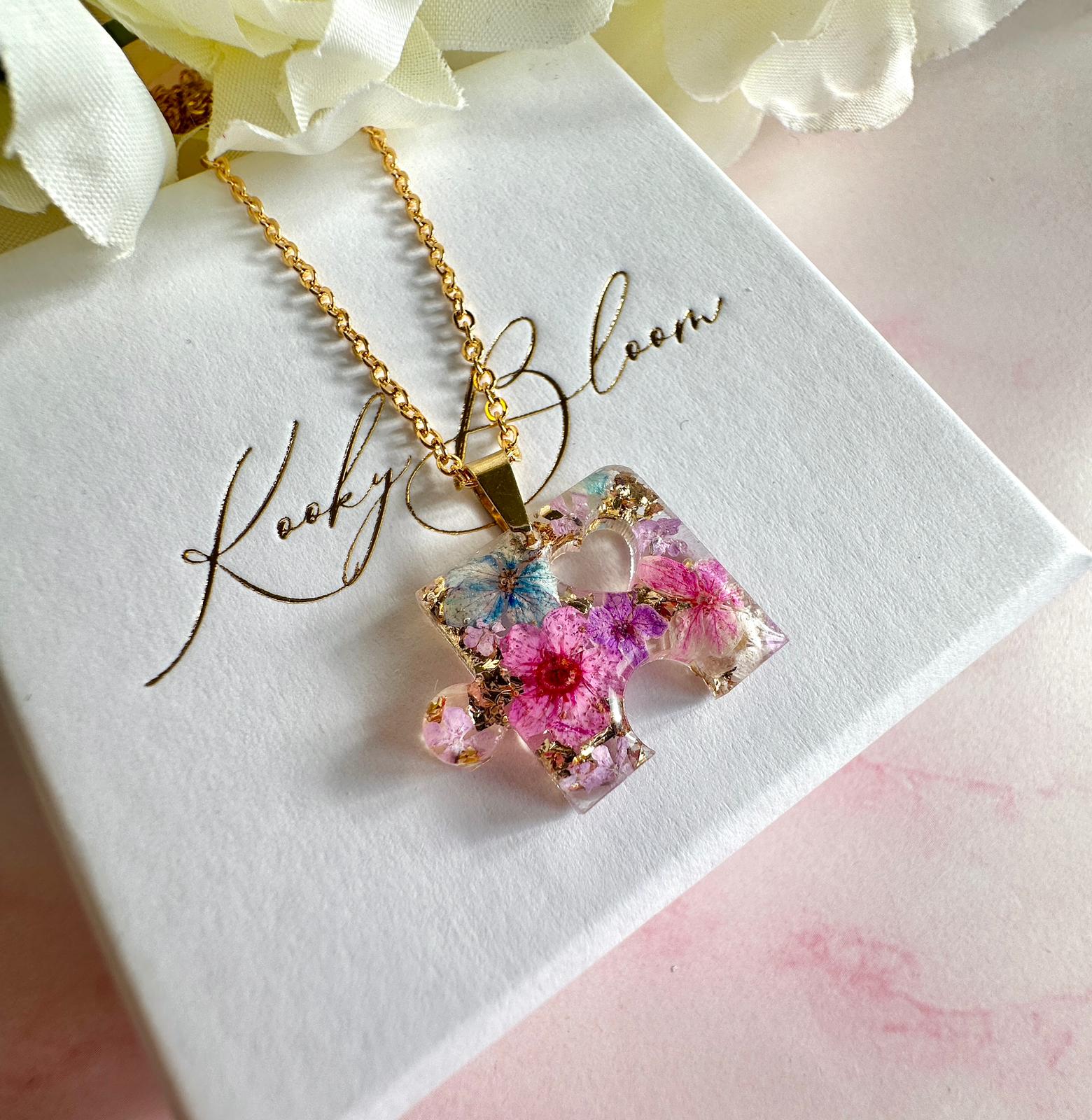 Gold real flower Jigsaw puzzle piece necklace.