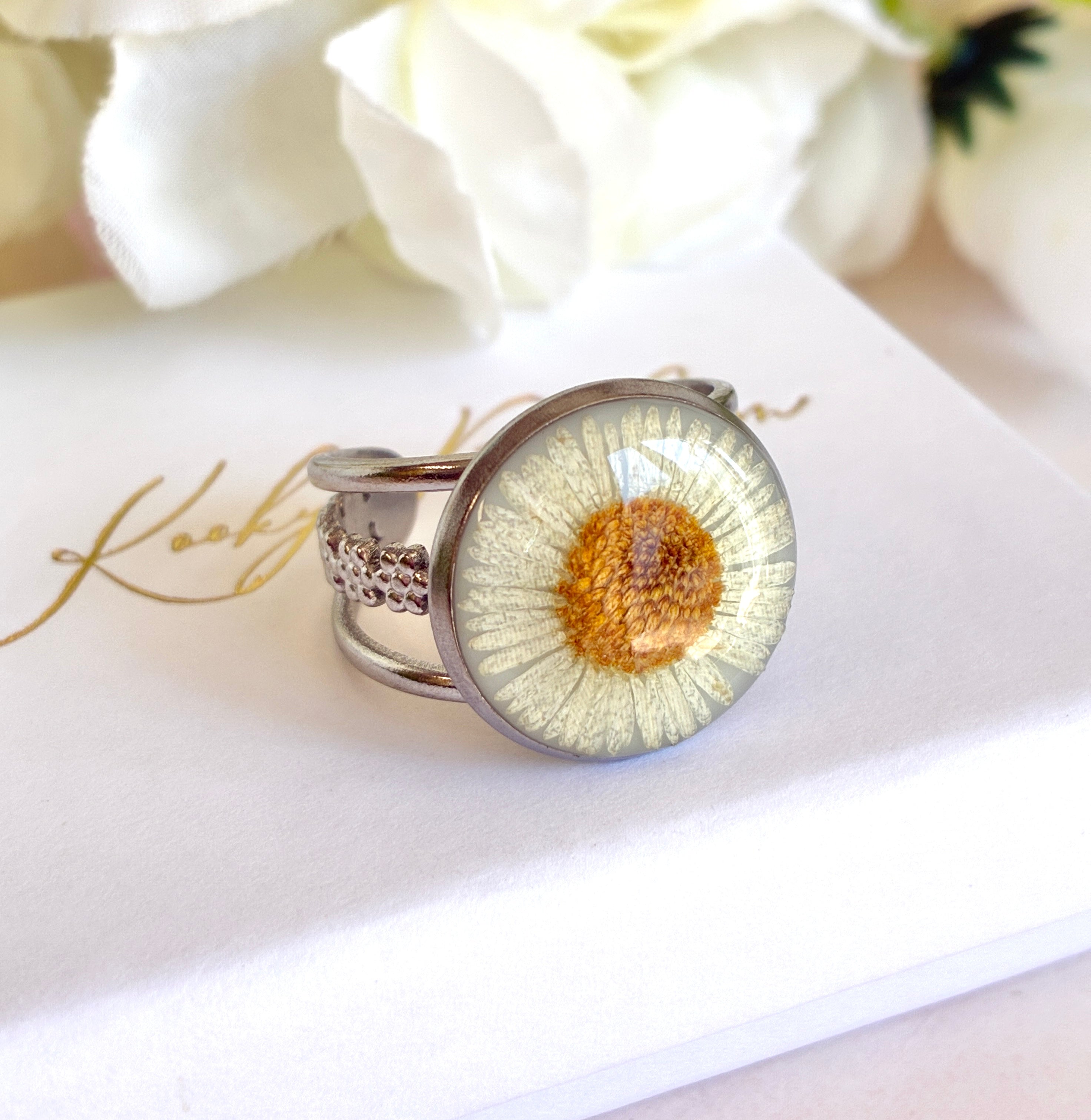 Silver Daisy Bloom cuff ring.
