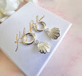 Silver Pearlescent Seashell Chunky huggie hoop earrings.