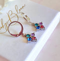 Silver pastel Quad Stone huggie earrings.