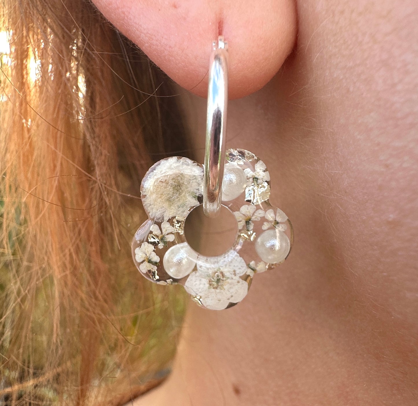Pearl & Petal white Flower Donut Earrings.