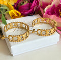 Gold star moon heart hoop earrings.