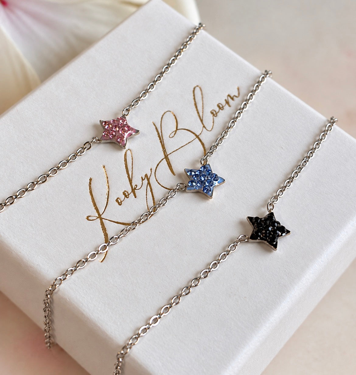 Silver Tiny Dainty Sparkly star necklace.