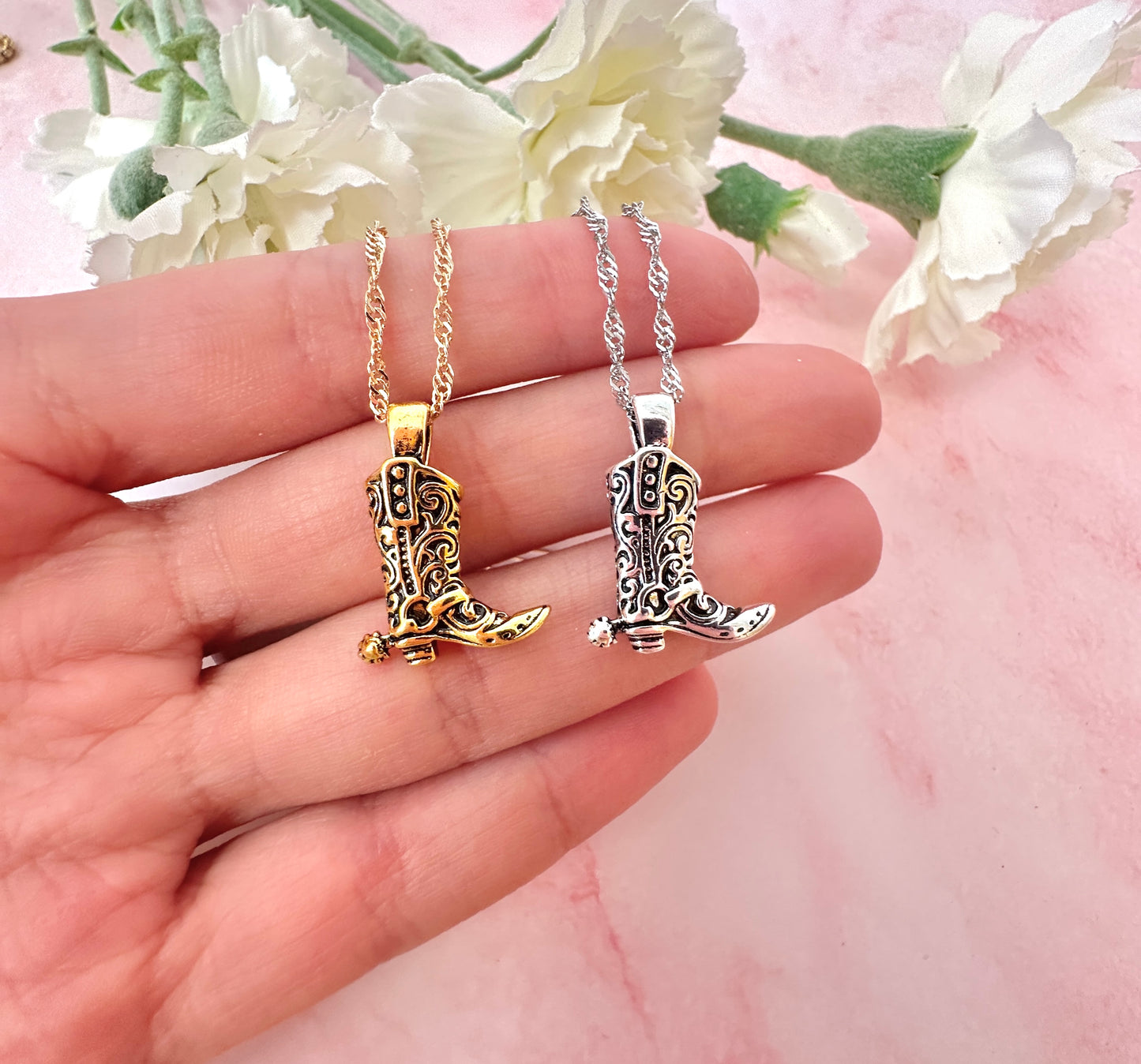 Cowboy boot necklace.