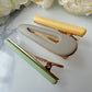Multipack Grey Green Yellow Alligator hair clips.