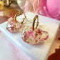 Autumn Brew Bloom flower teacup earrings.