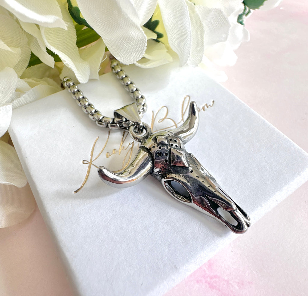Silver longhorn necklace.