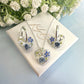Mini Powder Blue Forget me not heart hoop earrings.