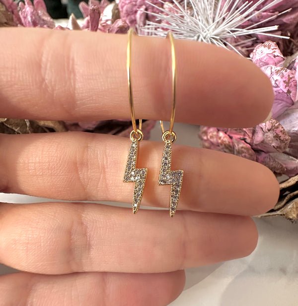 Gold CZ Lightning Bolt Hoop earrings.