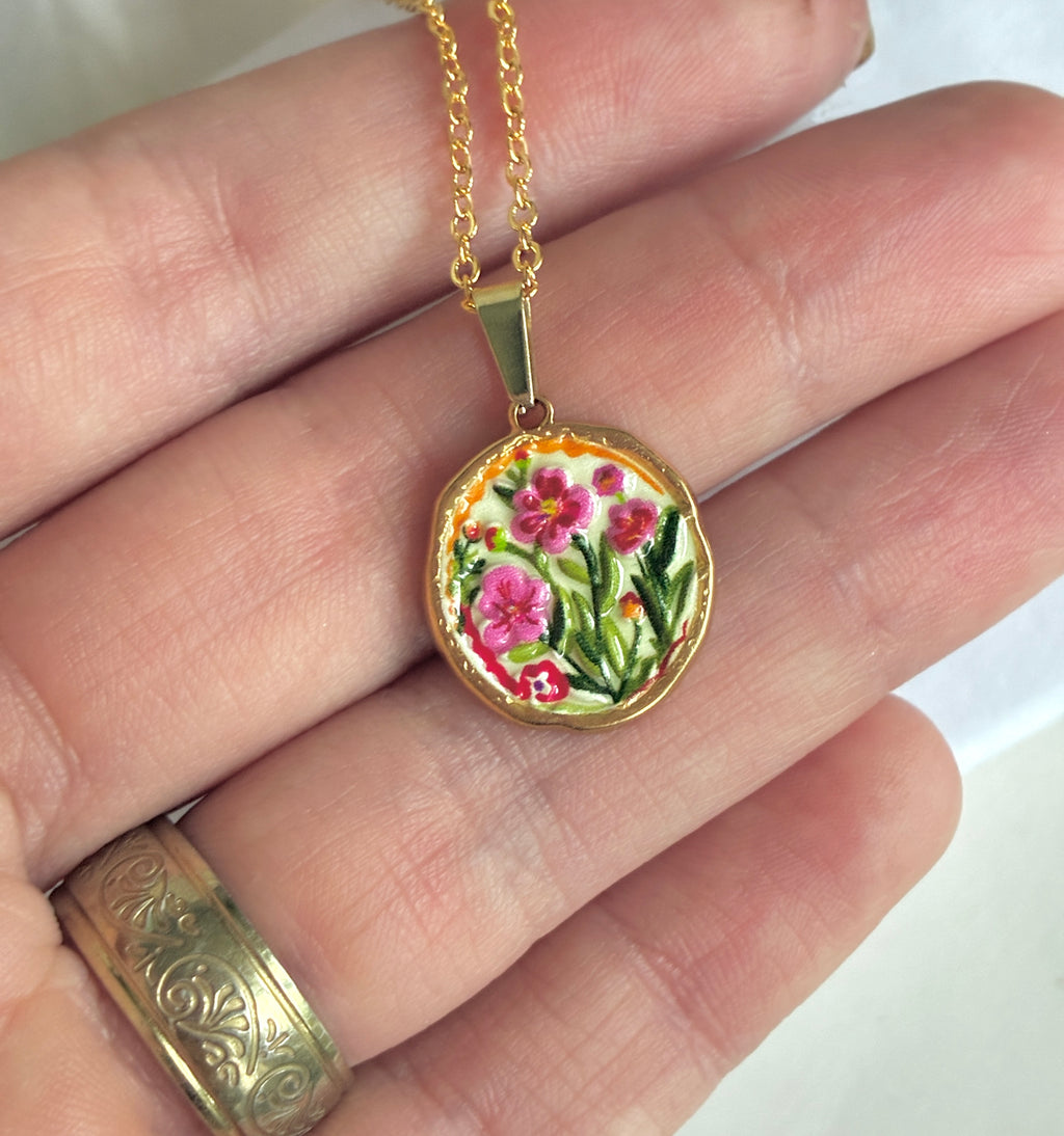 Gold flower garden pendant necklace.