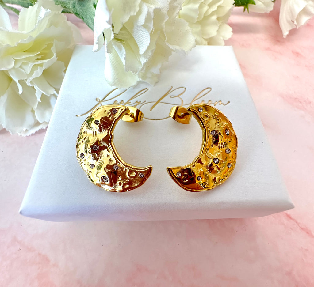 Gold oversized organ CZ Moon stud earrings .