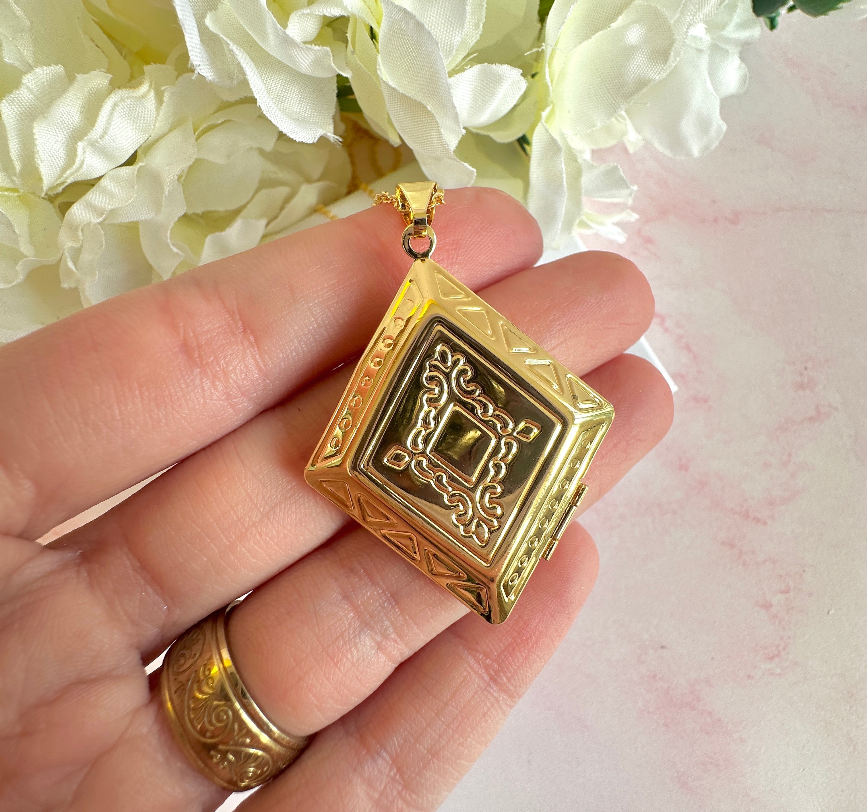 Gold Rhombus Locket necklace.
