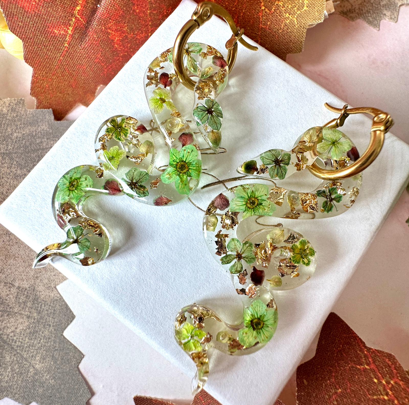 Snake real flower hoop earrings.