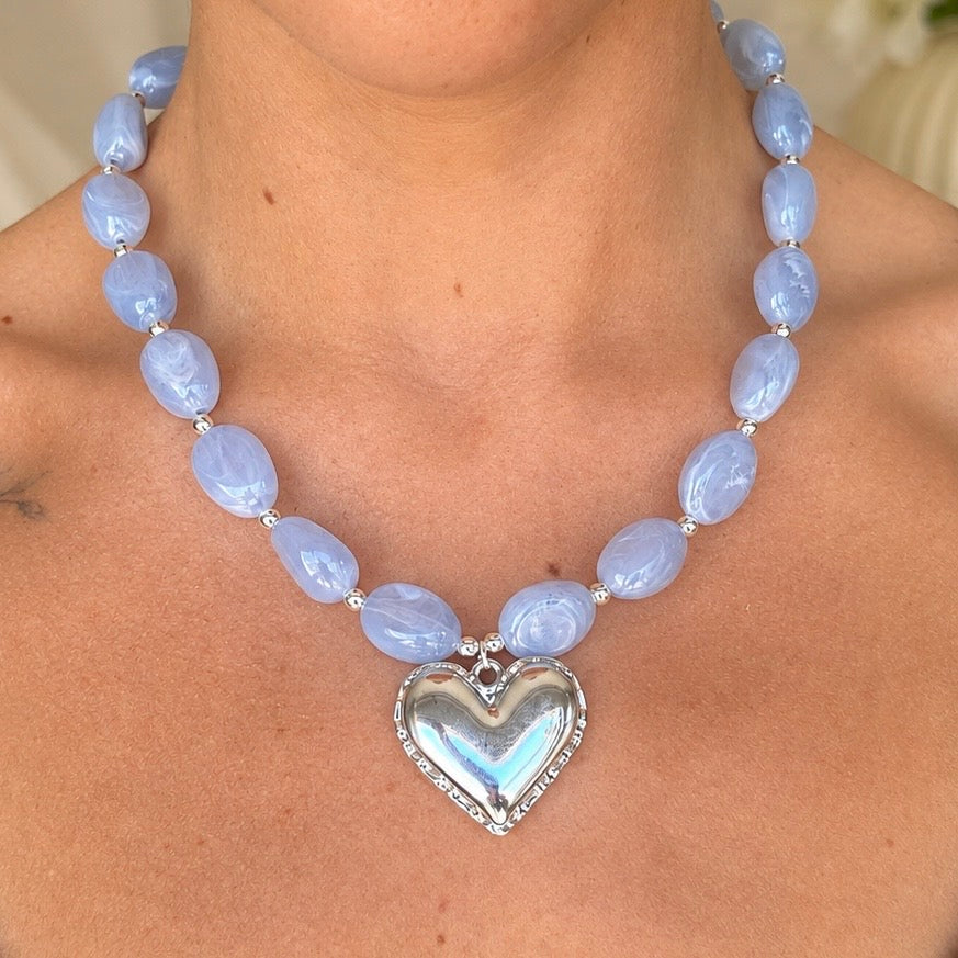 Silver chunky pale blue stone Heart necklace.