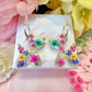 Balloon Dog bloom hoop earrings.