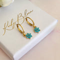 Gold tiny Turquoise CZ flower huggies.