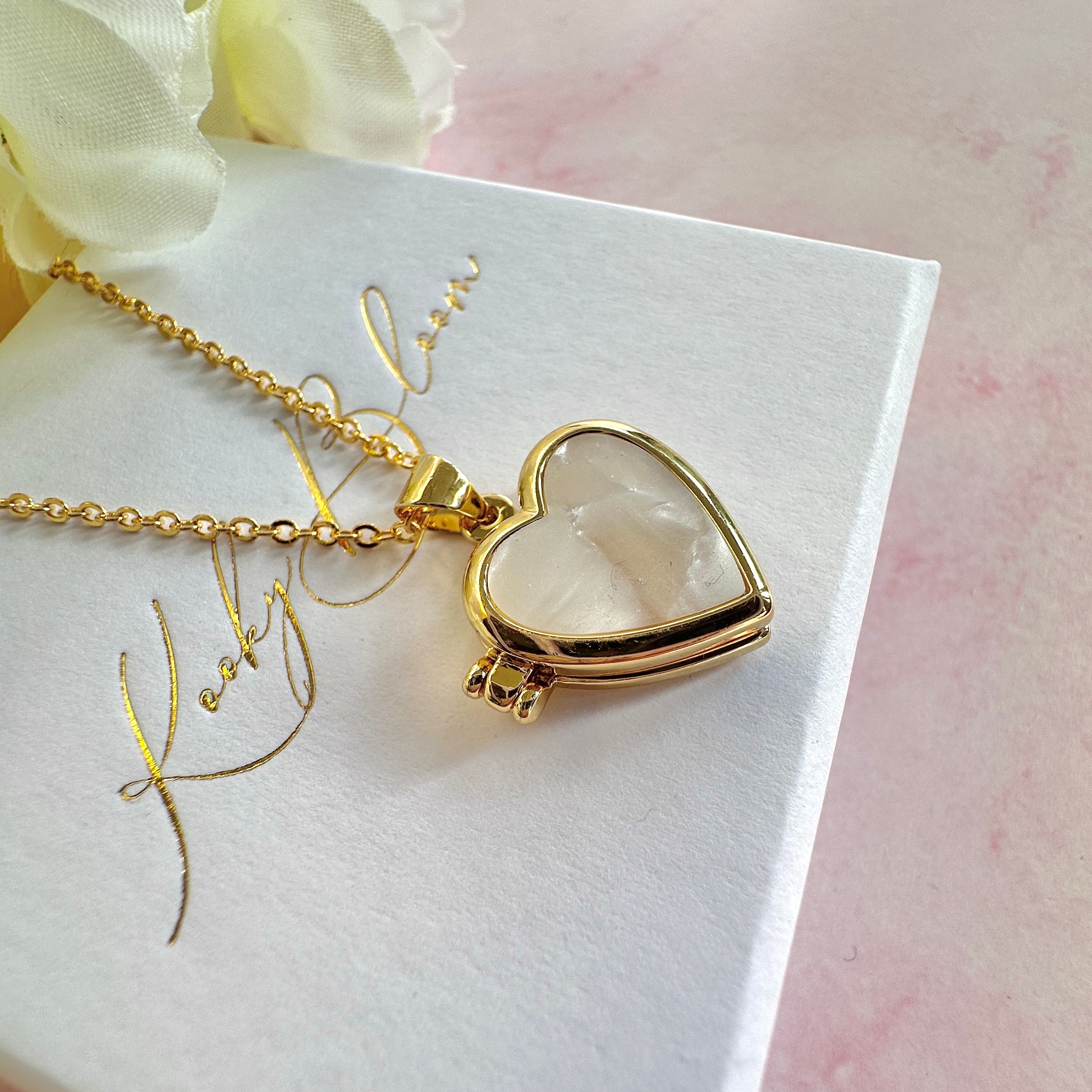 Gold Pearl Shell Heart Locket necklace.