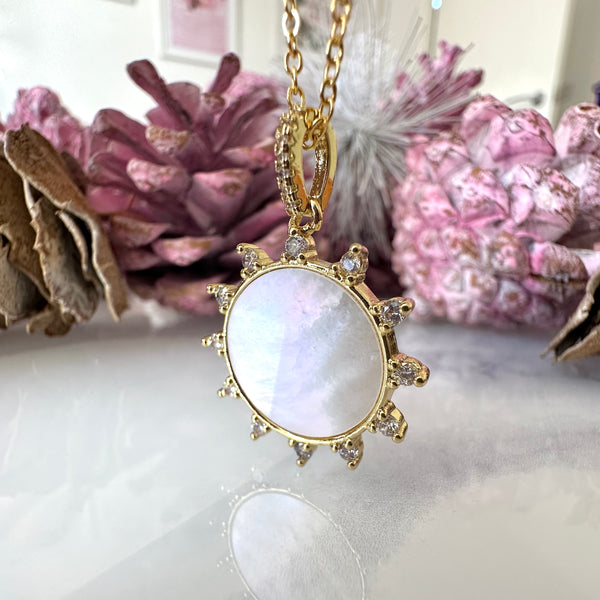 Gold Shell Sun CZ necklace.