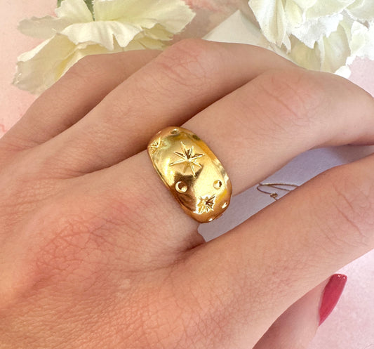 Gold domed celestial ring.