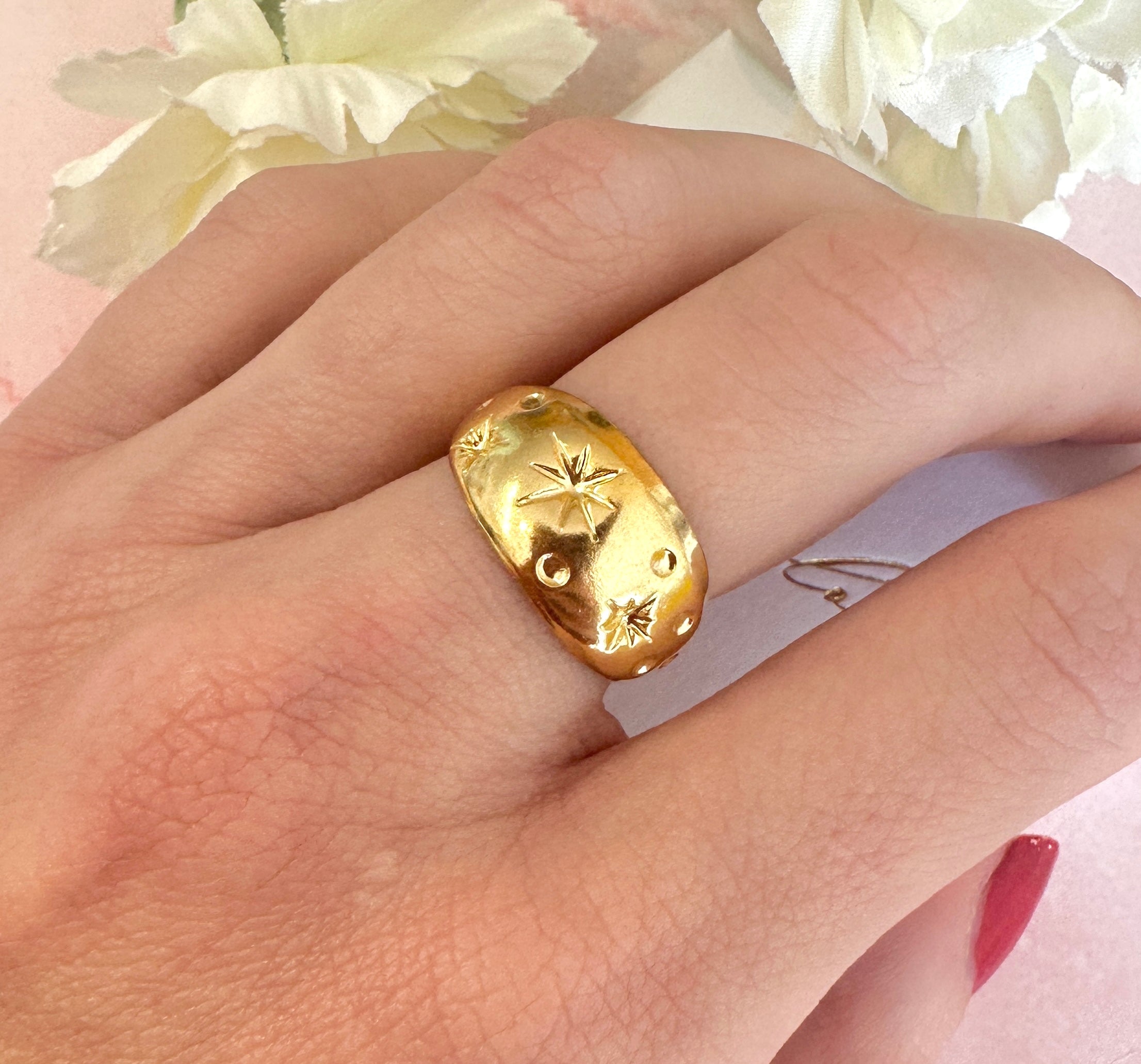 Gold domed celestial ring.