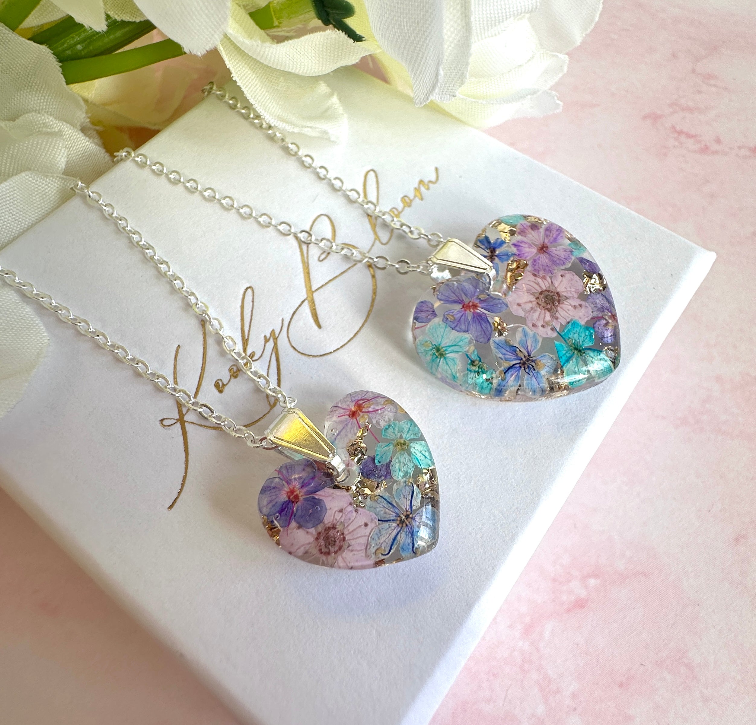 Silver Mini Violet meadow heart necklace.