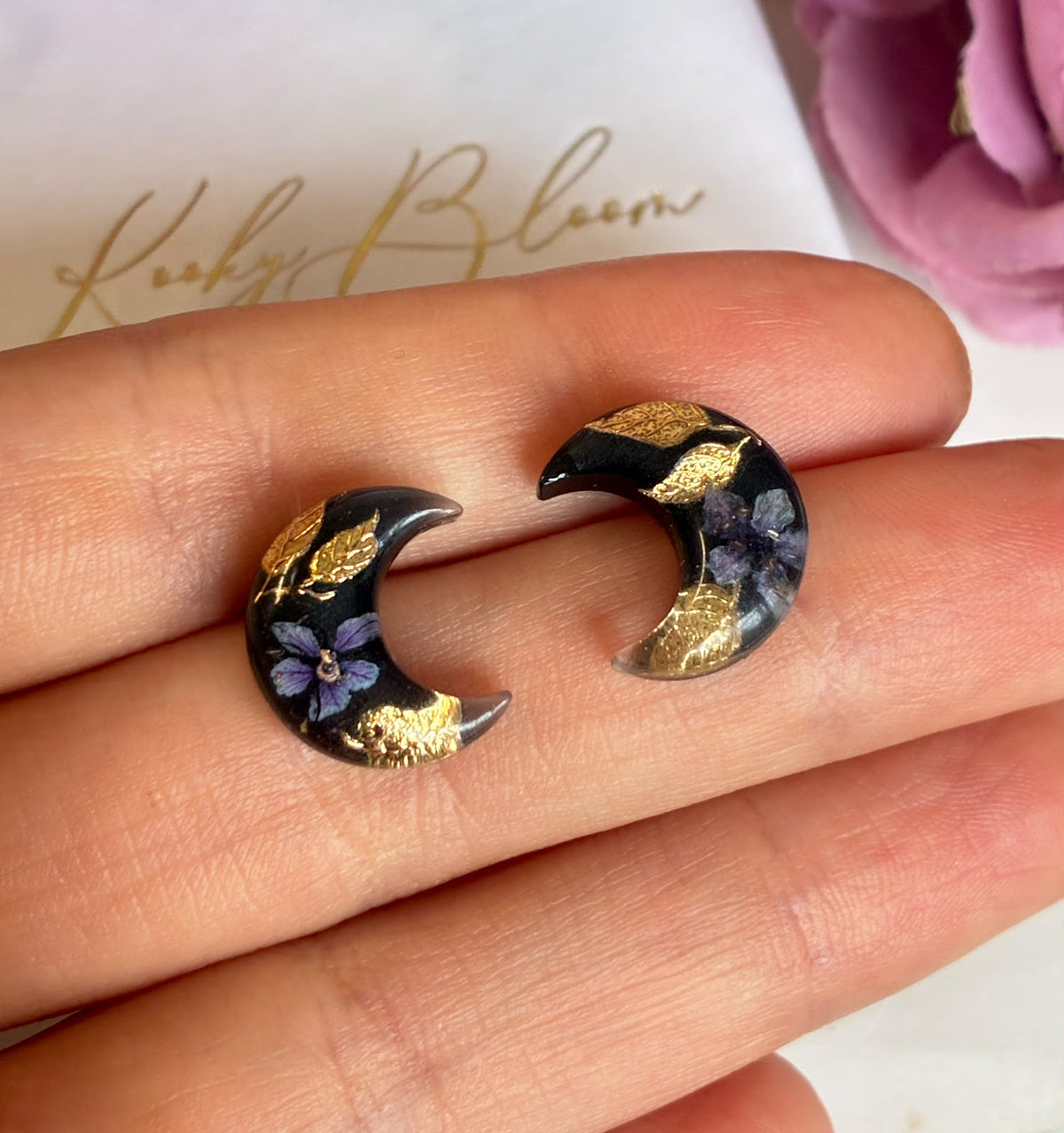 Mystical Dark Bloom Moon stud earrings.