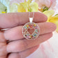 Silver Pastel confetti flower Heart necklace.