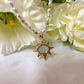 Pearl Gold Shell sun eye necklace.