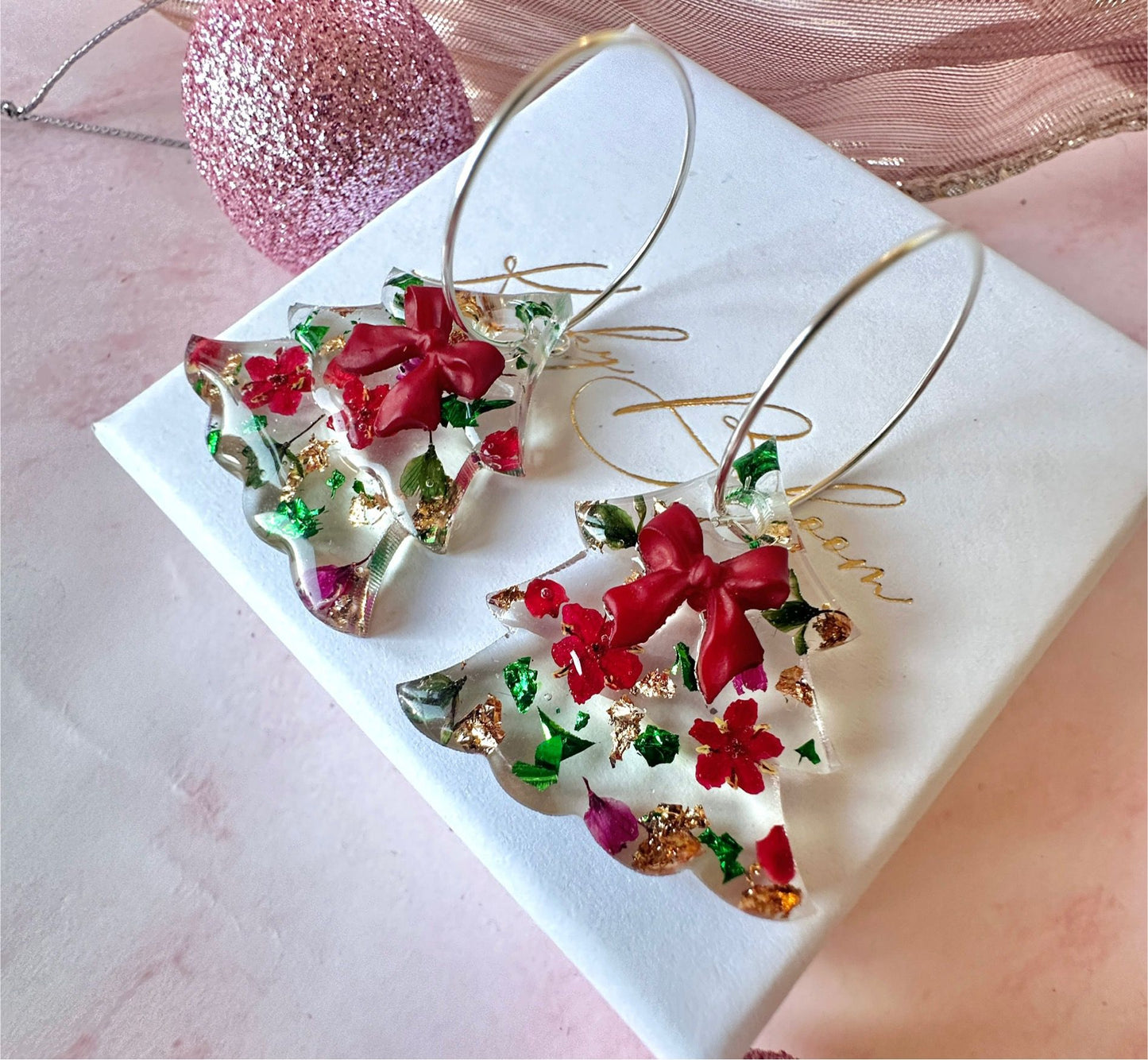 Bloom bow Christmas Tree earrings.