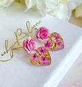 Pink Rose Drop Heart bloom stud earrings.