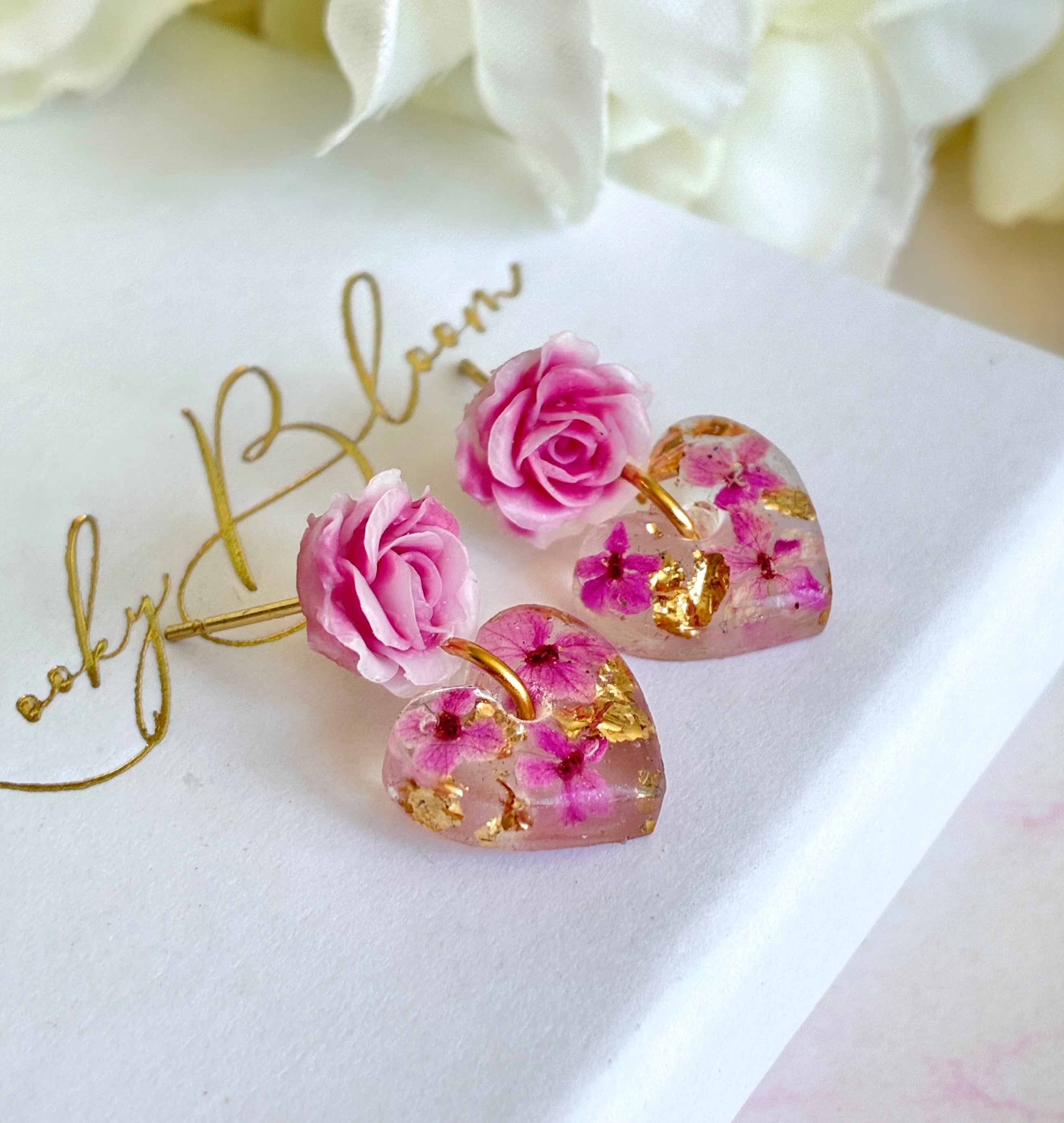 Pink Rose Drop Heart bloom stud earrings.