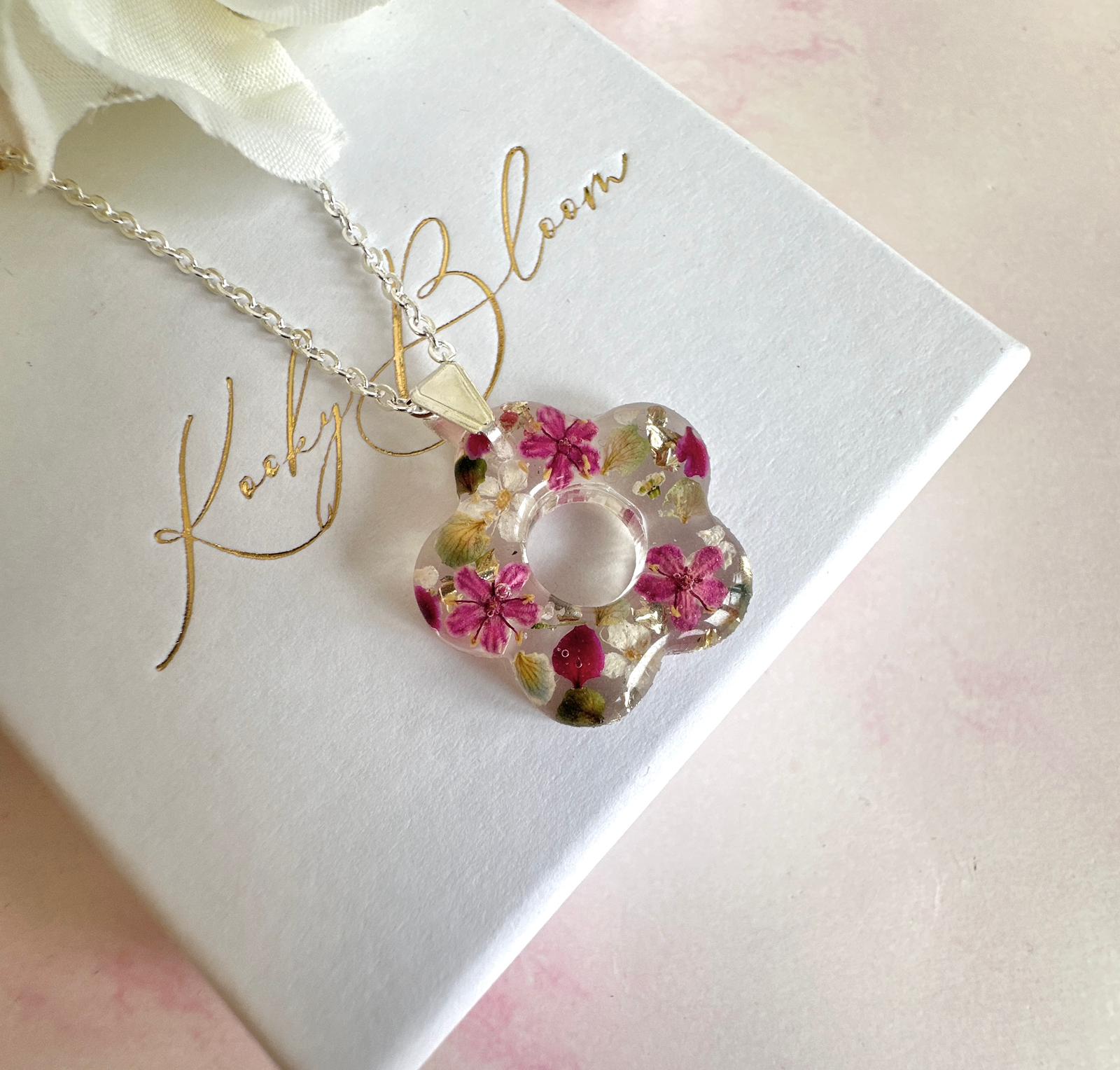 Silver Raspberry ripple Bloom Flower necklace.